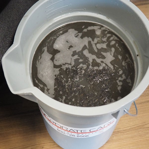 Wastewater (pulled from the carpet) from the wet extraction process